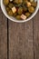 Overhead view of olives with cheese served in bowl