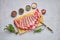 Overhead view of raw fresh deer ribs with spice and herb