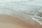 Overhead View of Sand piper birds on a sandy beach in Pacifica, California, USA