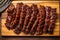 overhead view of sticky ribs on a wooden board