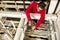 Overhead view of technician repairing water pump on a piece of industrial equipment