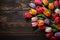 Overhead view Vibrant tulips arranged on rustic wood table surface