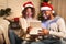 Overjoyed afro couple open xmas box and looking inside