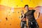 Overjoyed man and woman posing in climbing gym.