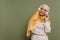 Overjoyed multiracial woman in hijab and