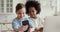 Overjoyed small diverse kids making selfie on smartphone.