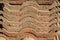 Overlapping aged brown roof tile