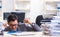 Overloaded with work employee under paperwork burden