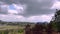 Overlooking buildings and hard winds storm clouds and rain