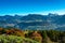 Overlooking the Schlern valley with the village of Kastelruth and the Dolomites mountains in the background