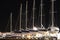 Overnight dry parking of yachts in the Croatian ACI marina of the town of Jazira. Burning lights of the evening Mediterranean port