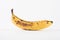 Overripe banana on a white background
