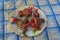 Overripe red radish in a plate