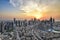 Overseeing Dubai cityscape during sunset from a high-rise building