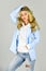 Oversize jacket. Classy and chic. Girl confident lady formal jacket hoodie and denim jeans. Pretty woman layered outfit