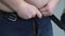 Oversize male zipping jeans under fat belly, hormonal disorder, slimming program