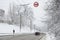 Overtaking is prohibited. The sign prohibits overtaking all vehicles on the road section. A road sign hanging over a snow-covered