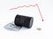 An overturned barrel of oil on dollars. diagram of falling oil prices in the form of a curve. global crisis