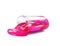 Overturned plastic container with magenta slime isolated. Antistress toy