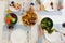 Overvew photo of healthy family dinner with baked potato and chiken and salad