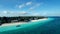 Overview of coast, boats, sunny Zanzibar, Tanzania, aerial