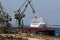 Overview of the cranes of the merchant port of Taranto, Puglia, Italy