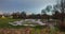 Overview of an empty pump track in evening hours. Popular pumptrack resting peacfully in the evening in fall