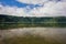 Overview lake, blue sky, clouds, trees Jose do Canto Forest Garden, Furnas, Sao Miguel, Azores Portugal