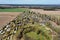 Overview of a large campsite between fields, meadows and arable land