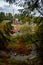 Overview of the Ligatne paper mill by the Ligatne River in Ligatne, Latvia during cloudy autumn day