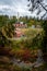 Overview of the Ligatne paper mill by the Ligatne River in Ligatne, Latvia during cloudy autumn day