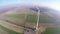 Overview of a lonely wind turbine in green meadow Poland