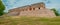 Overview of a Mayan Temple with its high entrance stairs, in the archaeological area of Uxmal