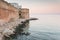 Overview of the old city walls in the historic center of Monopoli in Puglia Apulia - southern Italy - View of the ancient beach