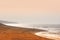 Overview over the The Black sand beach on the west coast