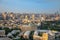 Overview panorama of central city business district and residential suburbs in sunset rays, Baku, Azerbaijan