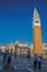 Overview of Piazza San Marco with steeple in the foreground and San Marco Basilica behind at Venice.