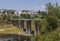 Overview of Portomarin and the New Bridge over the river Miño, landmarks along the Camino de Santiago , Spain.