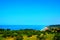 Overview from the San Giovanni in Venere abbey with green land descending to the coastline