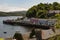 Overview of the scenic harbour and colourful buildings on the harbour in Portree, UK