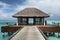 Overwater bungalow in a  sandy beach in Maldives Island, Pacific Ocean, Asia