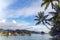 Overwater bungalows stretching and a wooden bridge out across the lagoon in Bora Bora island