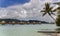 Overwater bungalows stretching and a wooden bridge out across the lagoon in Bora Bora island