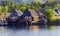 Overwater thatched roof bungalow resort