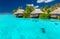 Overwater villas in lagoon of Moorea Island