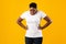 Overweight Black Woman Having Stomachache Standing Over Yellow Studio Background