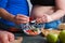 Overweight couple cooking vegetable salad. Dieting, weight losin