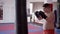 Overweight kickboxer in slow motion
