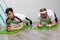 An overweight man is stressed to the limit while standing in the bar during fitness group classes