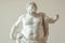 Overweight marble sculpture. Statue of a person with obesity, fat people, obesity, body size, dieting and nutrition, body